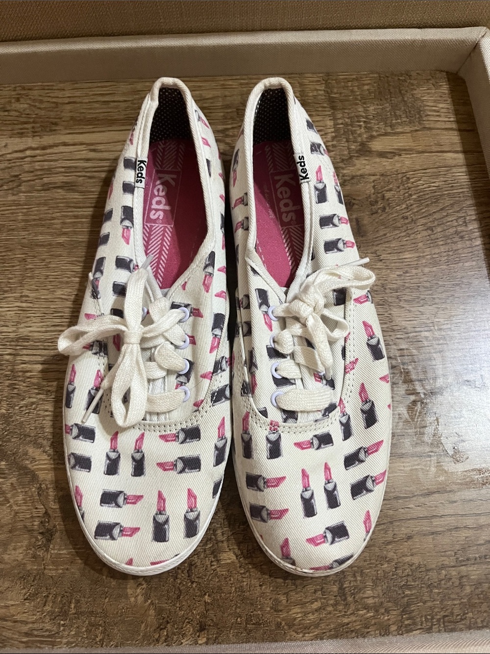 Keds Women’s Cream Canvas Sneakers with Pink Lipstick Pattern